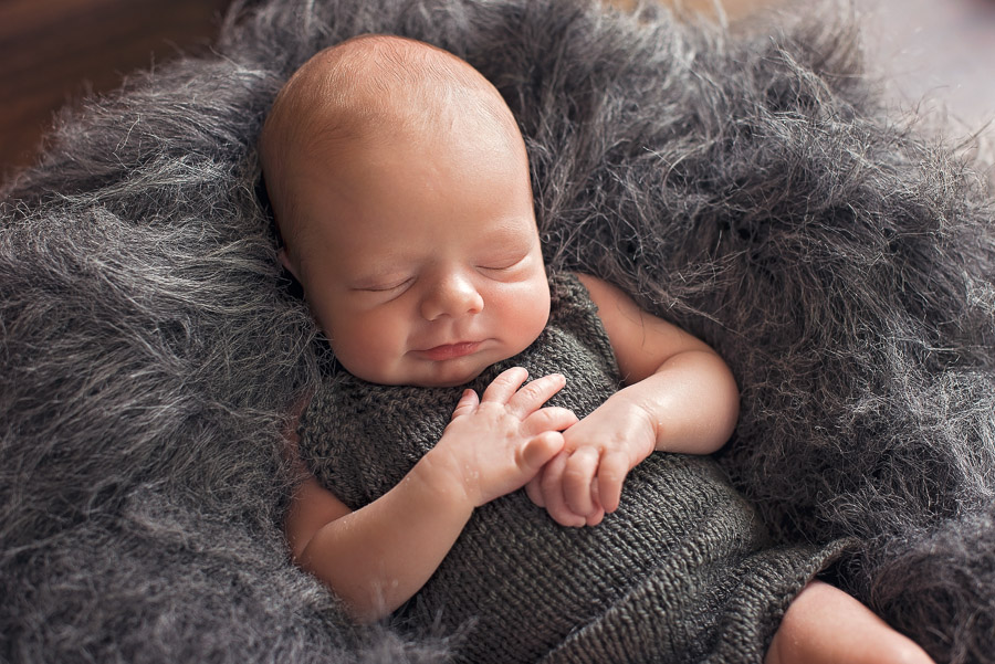 newborn baby boy photography smile grey outfit photographs